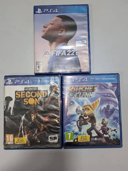 ps4 pro 1tb 10/10 non jailbreak 2 controllers 3 game cds FIFA 22 and 2