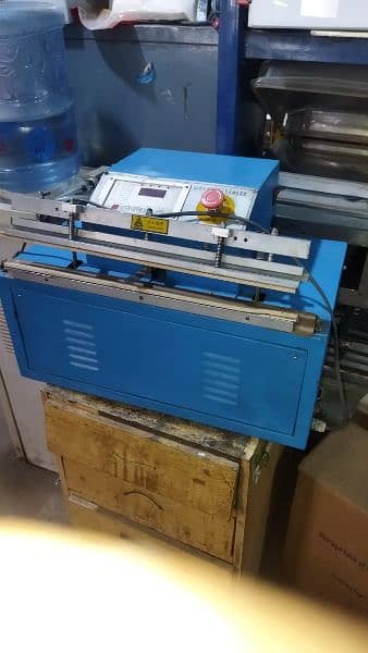 Vacuum packing machine 14