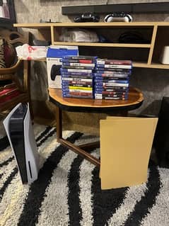 ps5 with dual controller and many physical games
