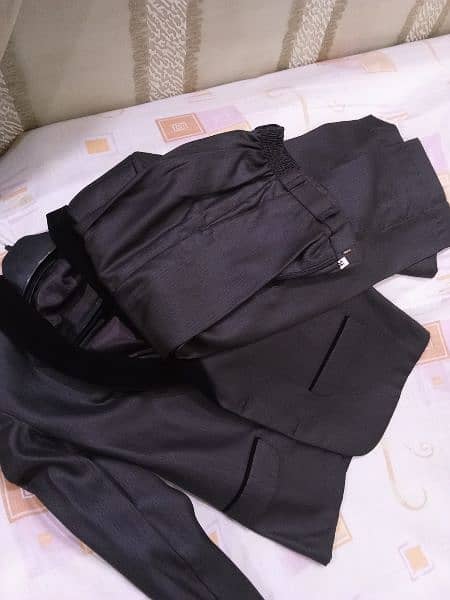 Two piece suit (coat and pant) 0