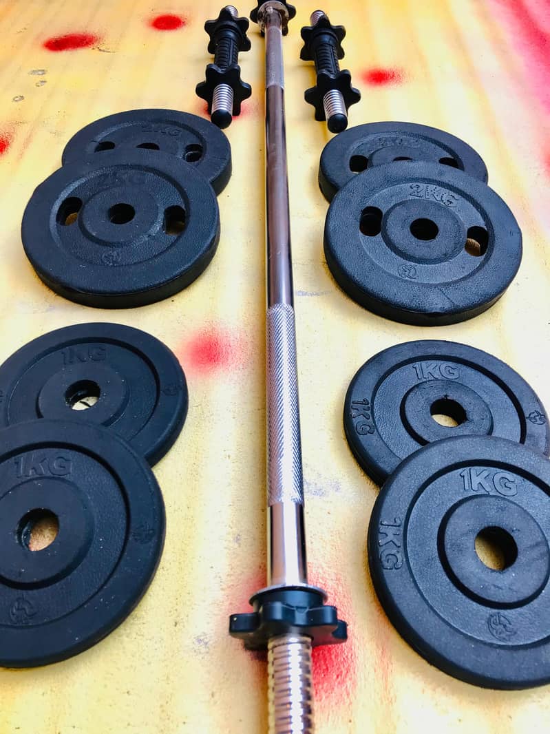 Home gym setup / dumbbell rods / plates / rubber coated plates 5