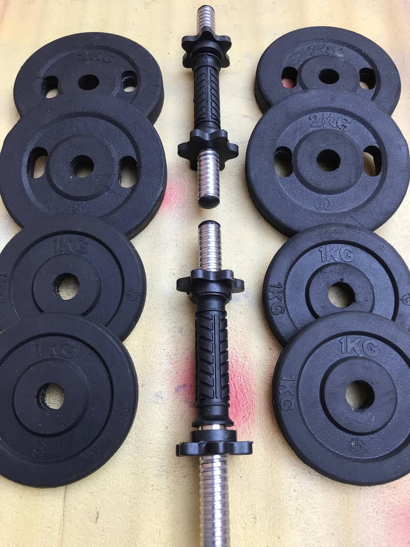 Home gym setup / dumbbell rods / plates / rubber coated plates 1