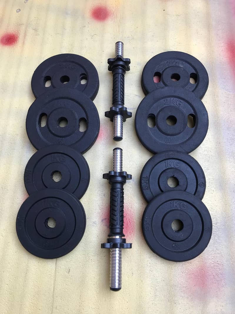 Home gym setup / dumbbell rods / plates / rubber coated plates 6