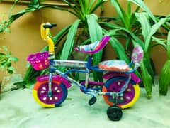 kids cycle in purple and pink colour