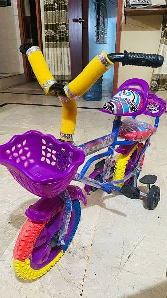 kids cycle in purple and pink colour 1