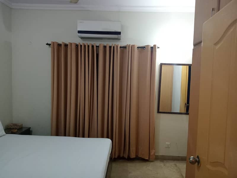 one persons master bed with a/c hotel doves room 4