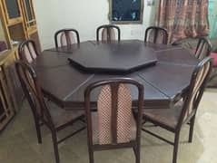 Round dining table with 8 chairs