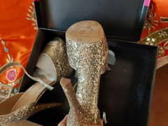Beautiful sparkling golden heels