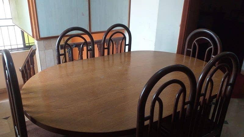 6 seater Wooden dinning table and chairs 1