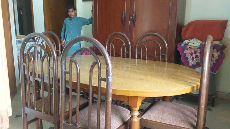 6 seater Wooden dinning table and chairs 2