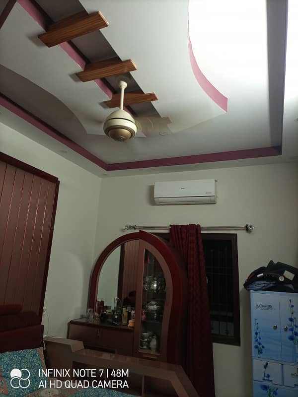 2 bed dd first floor Corner half portion available for sale at azizabad 9