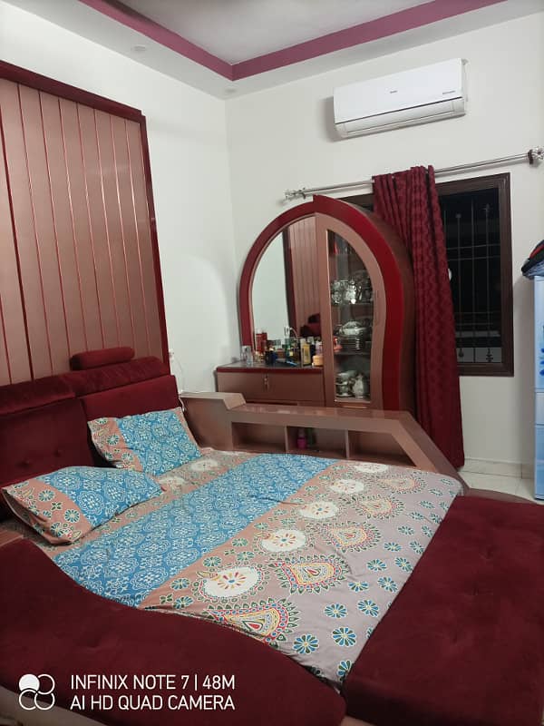 2 bed dd first floor Corner half portion available for sale at azizabad 10