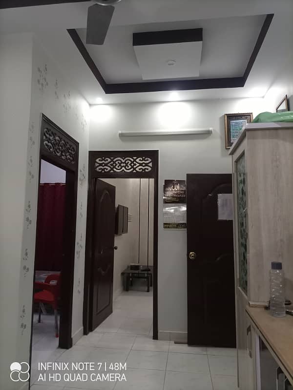2 bed dd first floor Corner half portion available for sale at azizabad 11