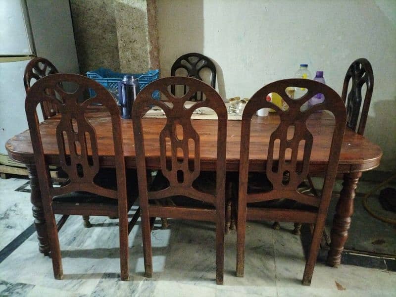 6x5 feet dining table and 6 chairs 0