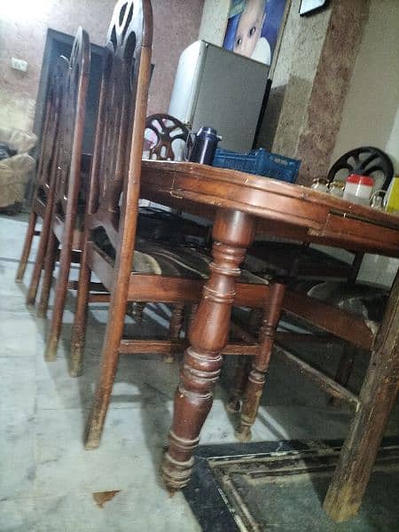 6x5 feet dining table and 6 chairs 1