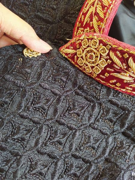 black sherwani fully embroidered grooms attire. 2
