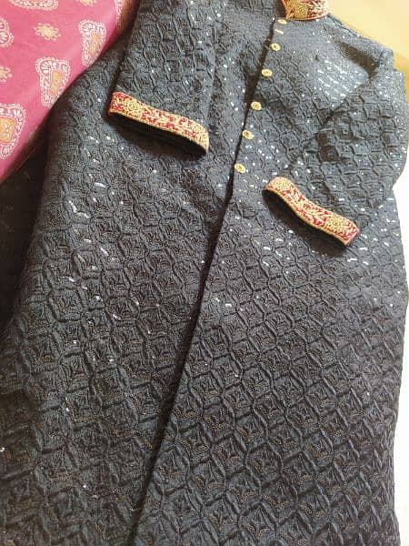 black sherwani fully embroidered grooms attire. 6