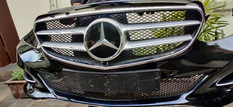 Mercedes E-class W212 2015 front rear bumber Grill and side skirts 18