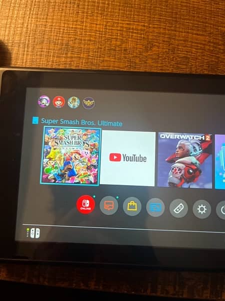 Nintendo switch with 4 joycons original and super smash bros ultimate 6