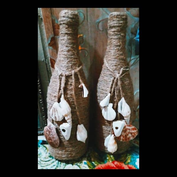 Bottles decor with rope and shells 0
