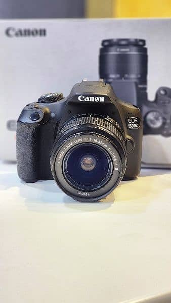 Canon 1500D with 18-55mm 0
