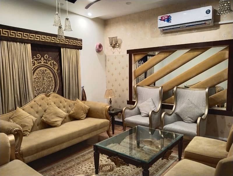 10 marla furnish house available for rent in jasmine block bahria town lahore 12