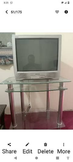 TV and trolley of glass