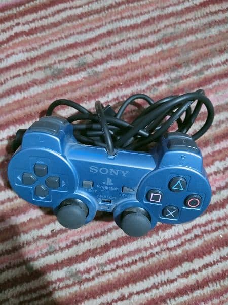 Playstation 2 with controllers and games 2