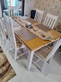 one year used. . . 6 chairs designer dinning. . .