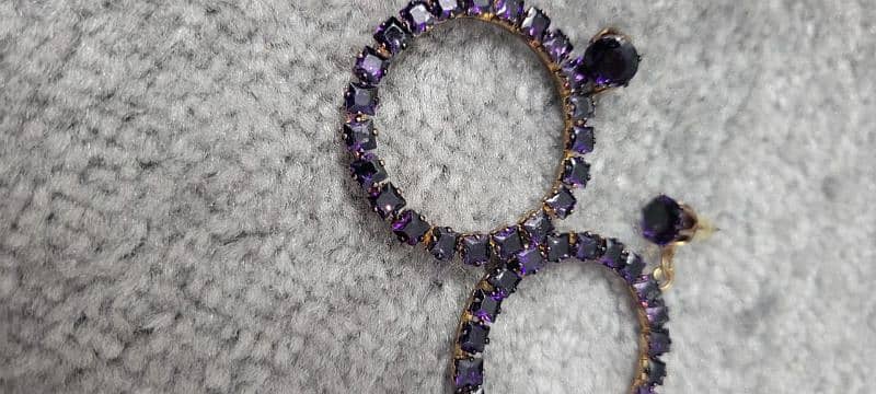 purple earings 0