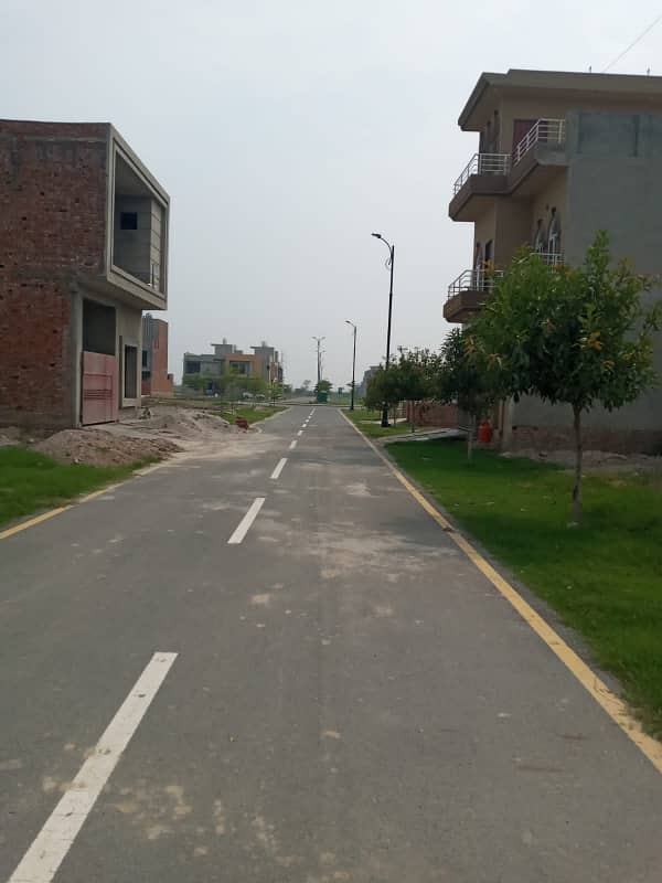 5 Marla Plot (3045) Park Facing A-Block Available For Sale in Lyallpur Avenue, Jaranwala Road, Faisalabad, Phase 1 (FDA Approved) with Registry 11