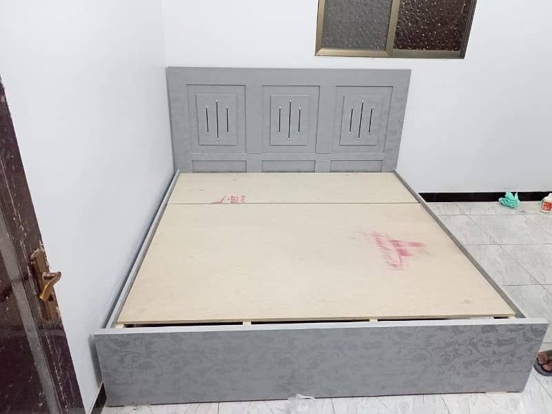 Double bed with wooden sheet and 3 door almari/wardrobes 1