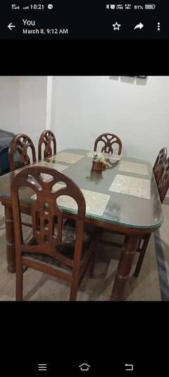 Woden dining table with 12mm glass and 6 chairs
