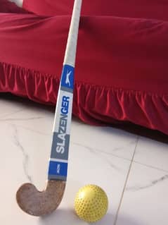 hockey stick for sale . ,with hockey ball .