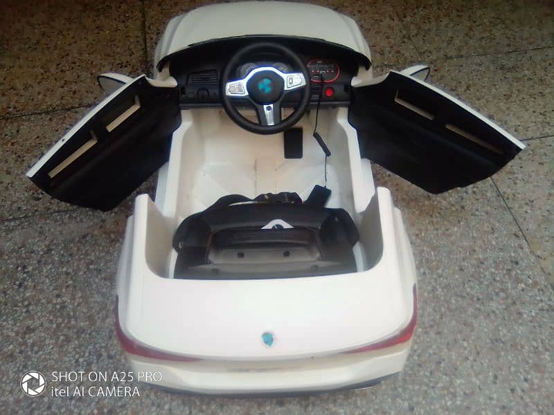 kids Electric Car With Battery & Three Motors 2