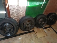 4 Dunlop tires 175 65 15 tyres with genuine honda city rims