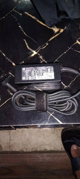 hp blue pin branded charger 0
