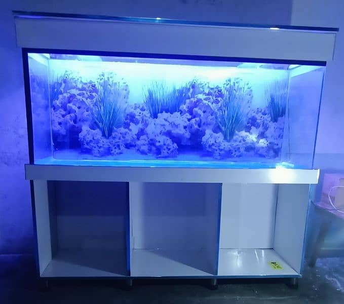 5 by 2 by 1.5 feet aquarium with solid stand and hood 7