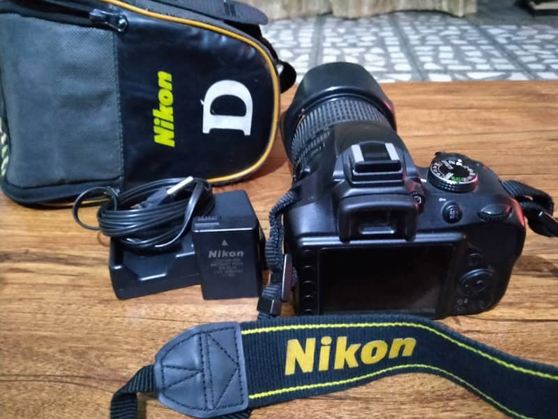 Nikon D3400 with 18-105 lens with bag 2gb SD card battery charger 8