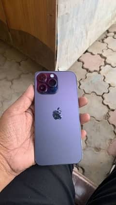 Iphone 14 pro deep purple 256gb non pta slightly 8 month use .