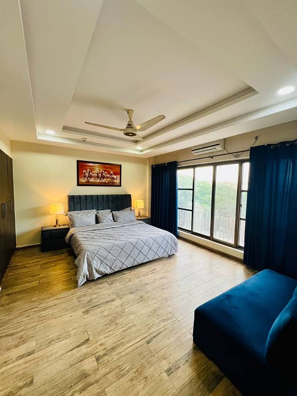Per day flat one bed fully furnished available bahria heights 1 1