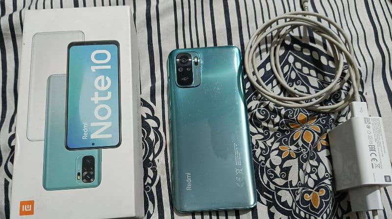 Redmi note 10 with original charger and box and original cover 0