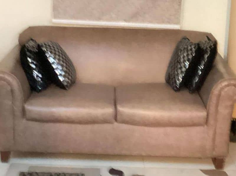 brown leathers sofa very good condition 2