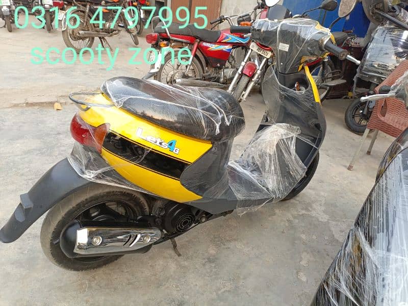 united scooter 100cc available contact at mobile 03004242432# 12