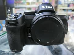 Nikon Z5 with 24x50mm lens all most new