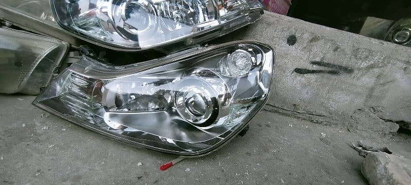 Nissan wingroad 2008 headlights 0