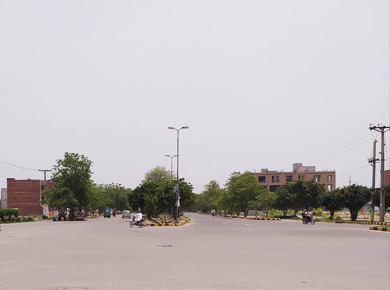 20 MARLA 150 ft Road PLOT AVAILABLE IN BLOCK B HOT LOCATION SPECIALLY FOR HIGH RISE FRESH FOUR STORY MAP APPROVED JUBILEE TOWN SOCIETY LAHORE IDEAL LOCATION FOR APARTMENTS , OFFICES , GROCERY STORES & MUCH MORE 9