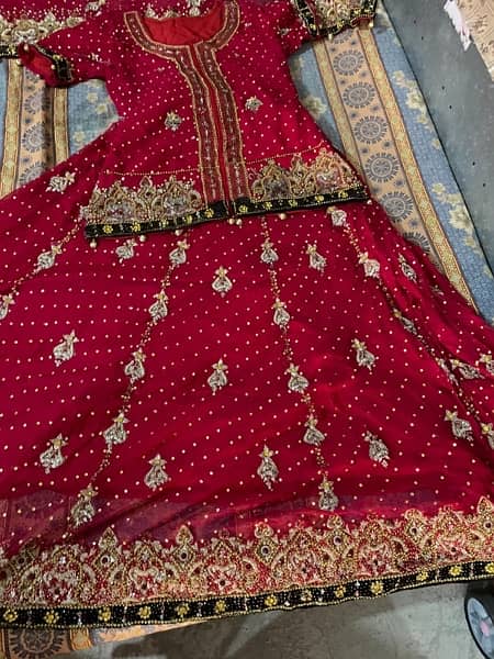 red lehnga with jewellery 0