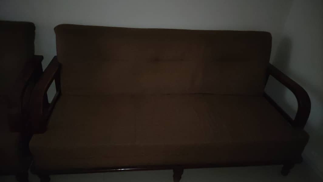 Brown colour sofas 1 seated and 2 seated  4 years used but minimal 1