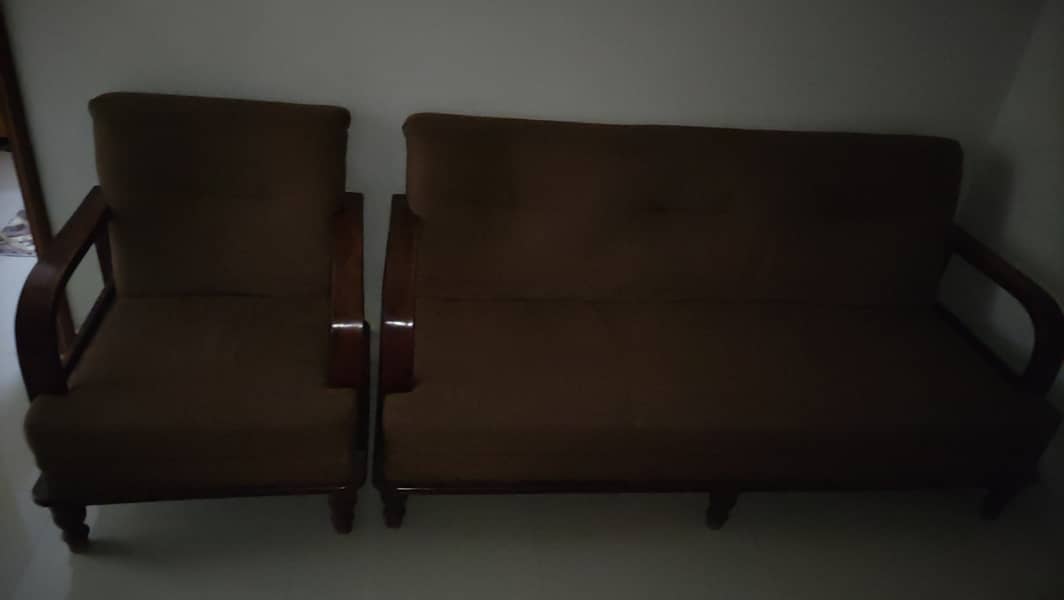 Brown colour sofas 1 seated and 2 seated  4 years used but minimal 3